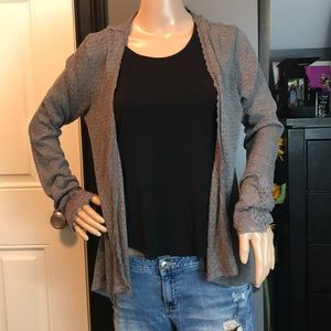 Maurice’s size medium. Very comfy. Gray